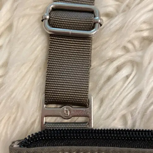 Baggallini Baggalini Shoulder Bag BNWOT color gray adjustable stripe lots of zippers