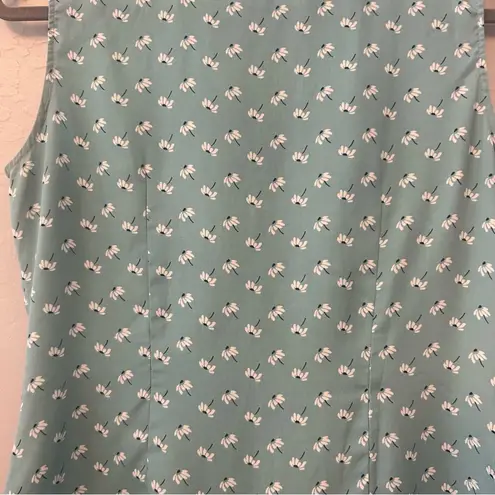 ⭐️Romy light teal blue sleeveless blouse with dandelion print and ruffles medium