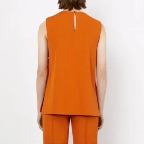 ZARA  Orange top with side buttons size XS