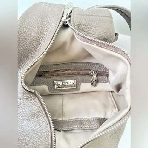 VALENTINA MULTIFUNCTIONAL TAUPE BACKPACK
SLING BAG Tan