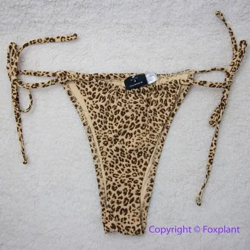 Thrills NEW Free People x mild animal print string bikini bottom, USA S