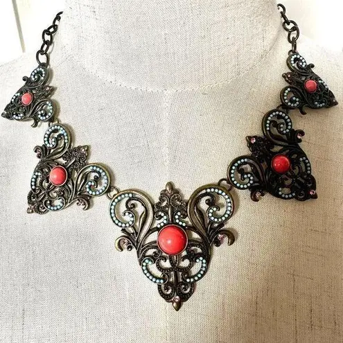 Plunder copper tone orange blue statement necklace