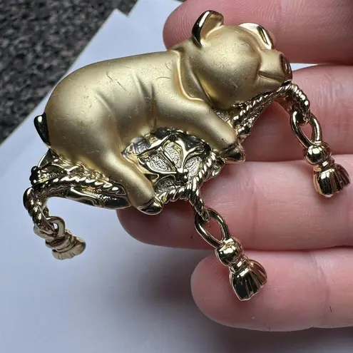 Signed AJC Gold Tone Pig On Tasseled Pillow Brooch Pin