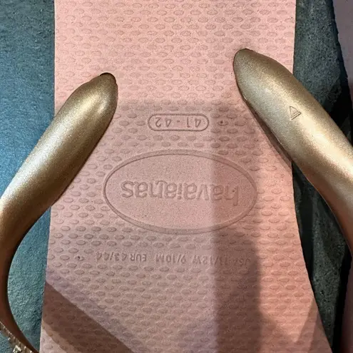 Havaianas  rose gold flip flops size 11/12