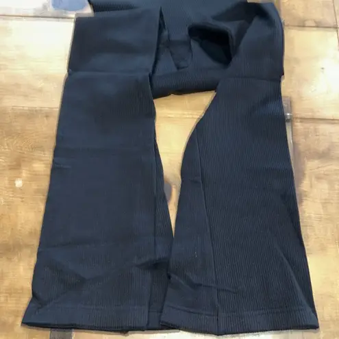 OQQ Woman’s yoga jumpsuit black ribbed bell bottoms Size Small