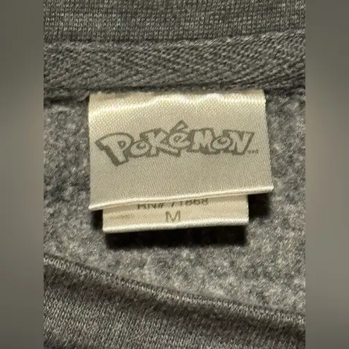 Pokémon EUC Pokemon Gray Sweater with Pokemon Patches size medium