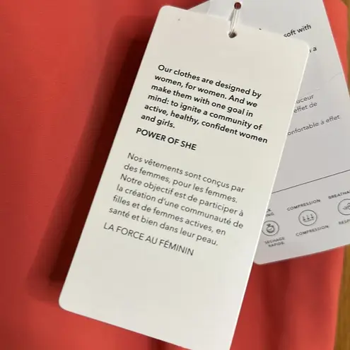 Athleta  Vibrant Coral Salutation Stash Pocket ll Capri Leggings New with Tags