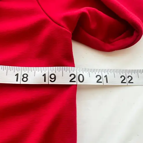 Joan Vass Red long sleeve drape front dress with pockets.