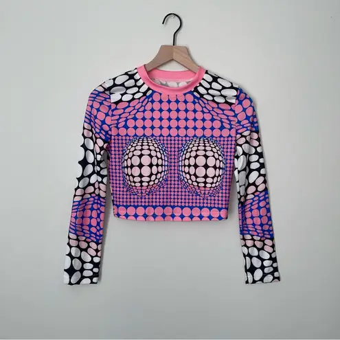 Trendingā Dynamic Polka Dotted Long Sleeve Crop Top Pink