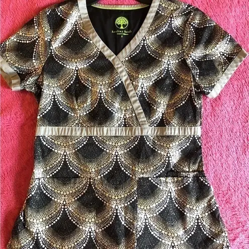 Healing Hands Women’s Black and Gold Patterned Women's Scrub Top Sz Small