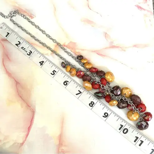 Multi beaded silver tone statement necklace