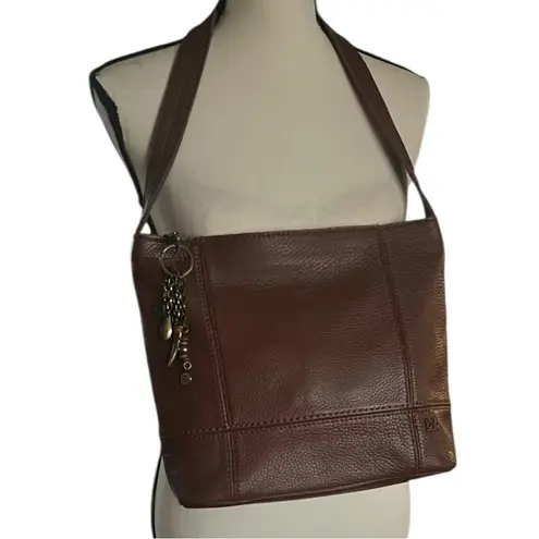 The Sak De Young Pebbled Leather Dangle Charms Shoulder Handbag.