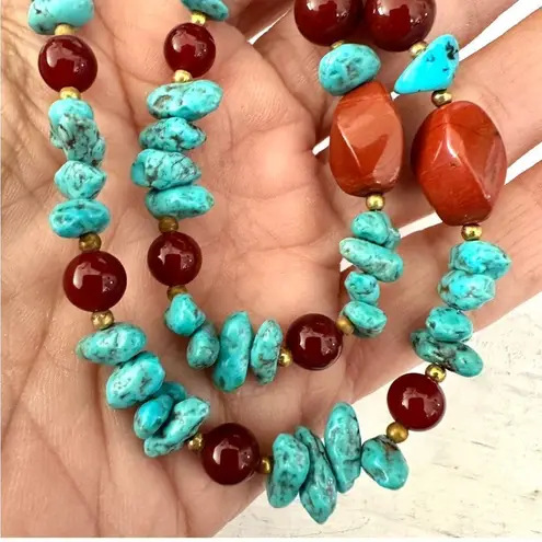 Brass elephant pendant necklace with carnelian, turquoise and red jasper beads