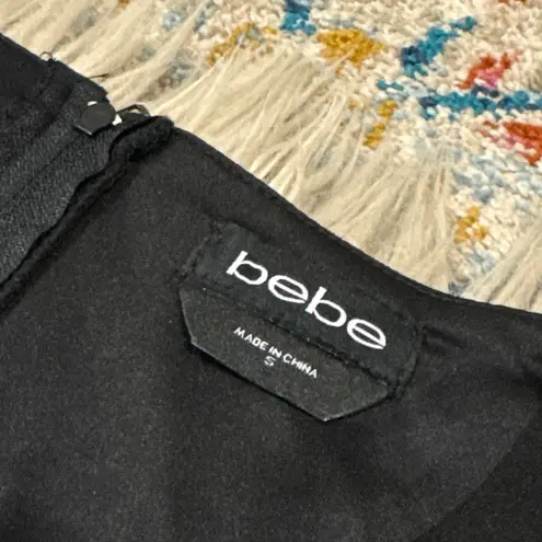 Bebe NWT  mesh v neck jumpsuit size small