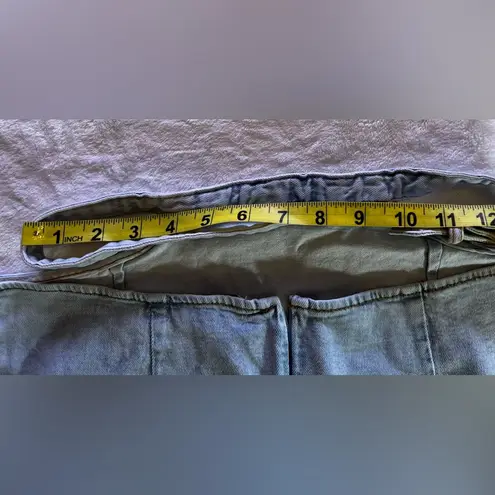 We Wore What  denim cut out mini skirt Light Denim Skirt Indigo Confort ($69) M