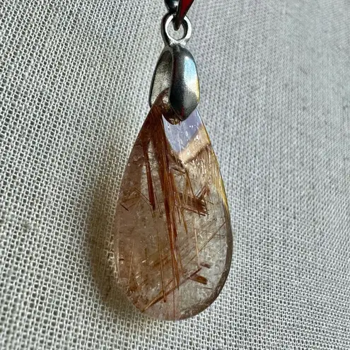Rutilated quartz teardrop pendant necklace on cord
