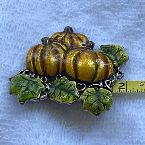 Pumpkin patch brooch enamel over pewter by AJMC. Orange