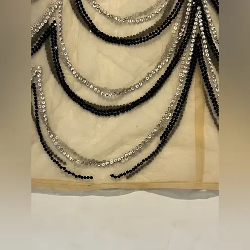 As seen in Bachelor Onalaja Farah Gown, size XS Tan