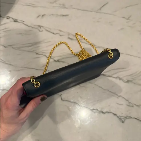 MCM Visetos Mina Crossbody Bag Dark Grey with a Pink Bow Accent