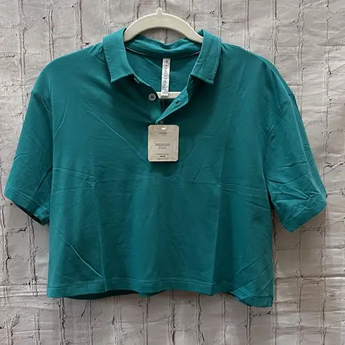 Fabletics NWT  Short Sleeve Boxy Polo Size Medium Dark Teal