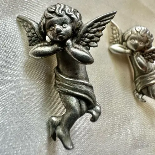 JJ Jonette removable cherub silver tone earrings