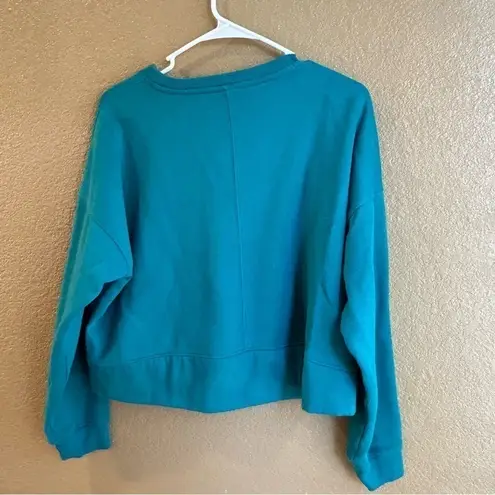 All In Motion  Lot-two cropped sweatshirts in size xs in both teal and hot pink