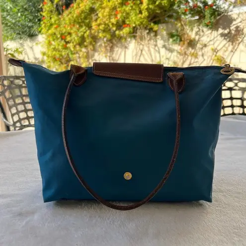 Longchamp  teal “Le Pilage” canvas tote bag serial number 1133332