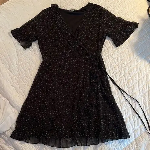 Black ruffled polka dot mini dress Size M