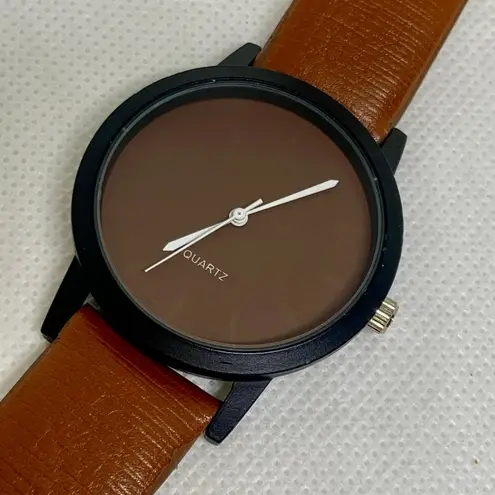 Women’s quartz watch black tone 35mm brown dial leather band running