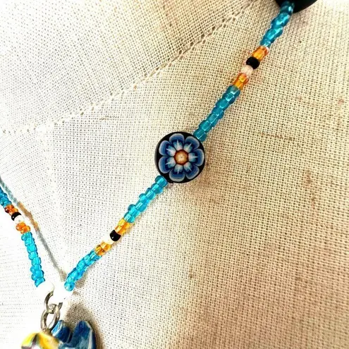 Beaded blue frog pendant necklace