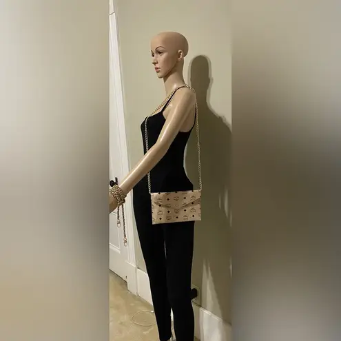 MCM Novelty Item Cream and Black Logo Clutch