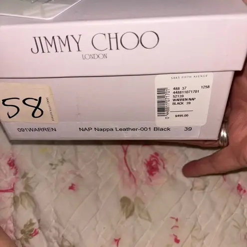 Jimmy Choo Black and Gold Flats with Studded Elegance