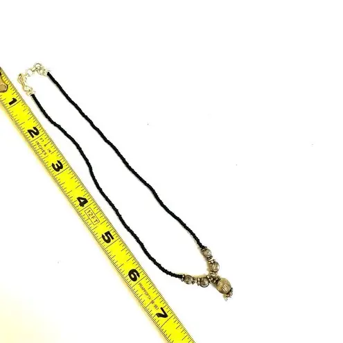 Black beaded silver tone choker necklace