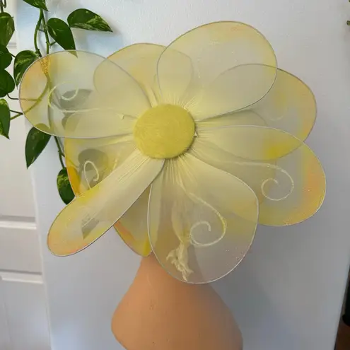 Handmade yellow floral hat. This hat was made for the stage in the theater.
