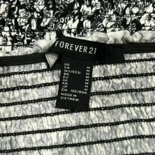 Forever 21  floral black and white scrunched halter top in size medium