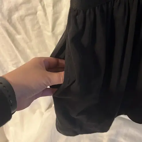 Atm Classic Jersey Romper with elastic cinched waist capped sleeves and pockets Black