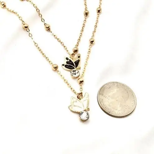 Set of Black and White Rhinestone Butterfly Necklaces Gold