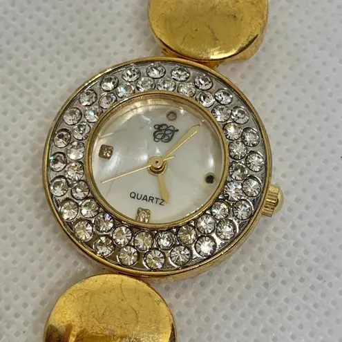 Elizabeth Taylor women gold tone watch 24mm round mop dial up to 7.5” running