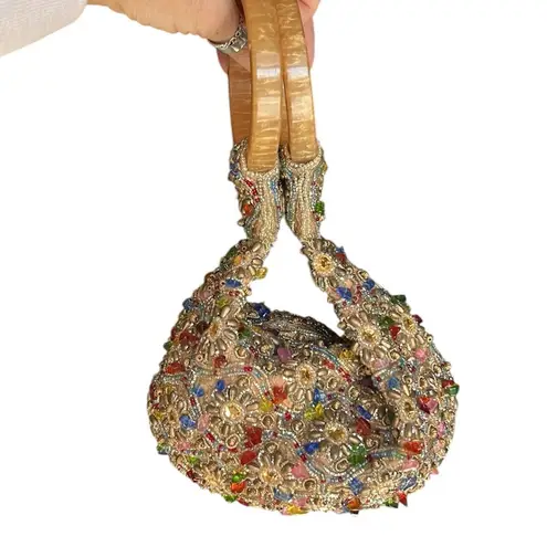 Sand Blossom Wristlet Bag Retailed for 98.00 Gold