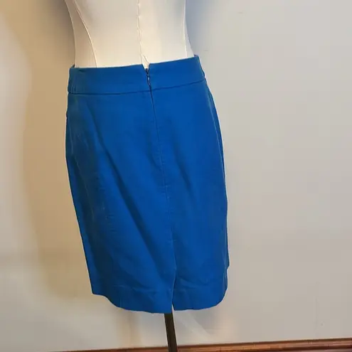 J.Crew , the pencil skirt blue with front pockets and a zipper in the back size 2