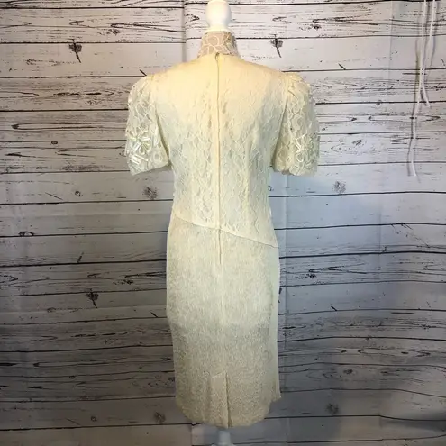 Leslie Fay  Vintage lace 70's dress with balloon sleeves and lots of details.