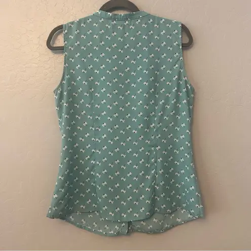 ⭐️Romy light teal blue sleeveless blouse with dandelion print and ruffles medium