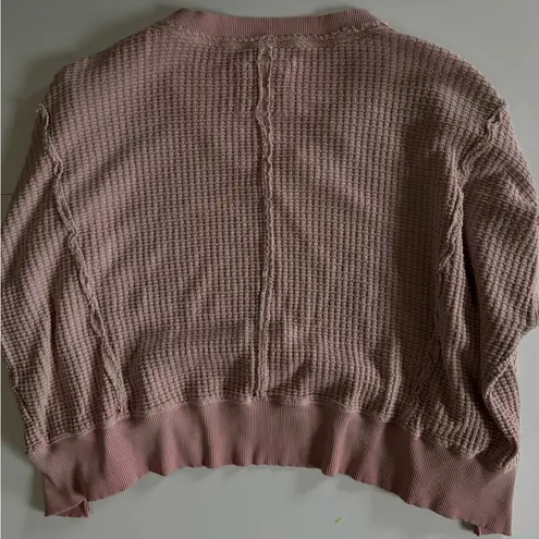 American Eagle AE Pink sweater with a relaxed fit the “This feels seriously lived in”