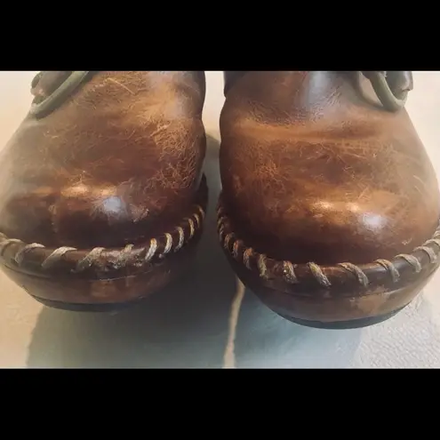 Frye  Charlotte Ring Mules in distressed brown.