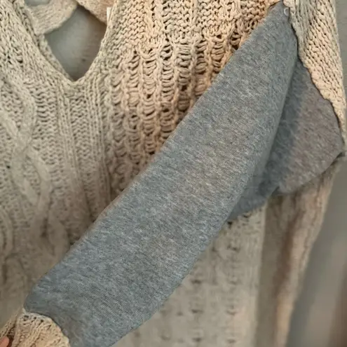 Oversized sweater with sweatshirt sleeves