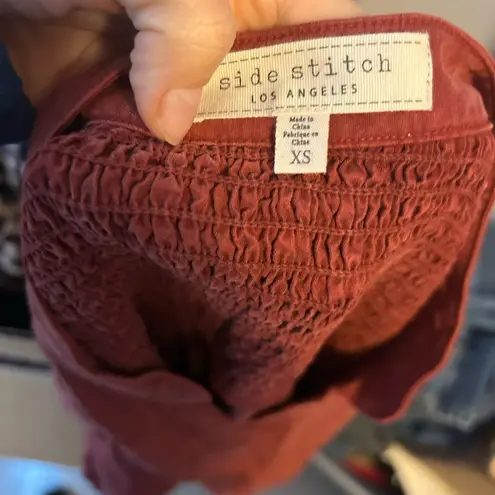 Side Stitch Burnt Orange Raw Hem Button