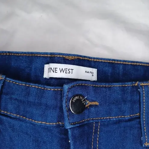 Nine West  kick flare jeans with raw hem