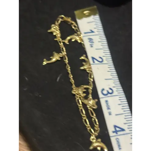 Gold Tone Dolphin Charm Bracelet 7"