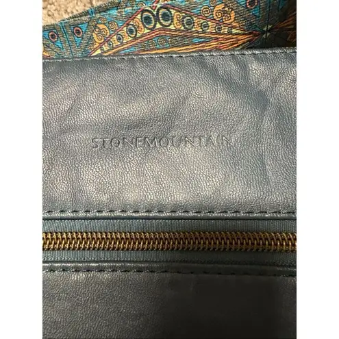 Stone Mountain Crossbody faux leather bag with guitar strap