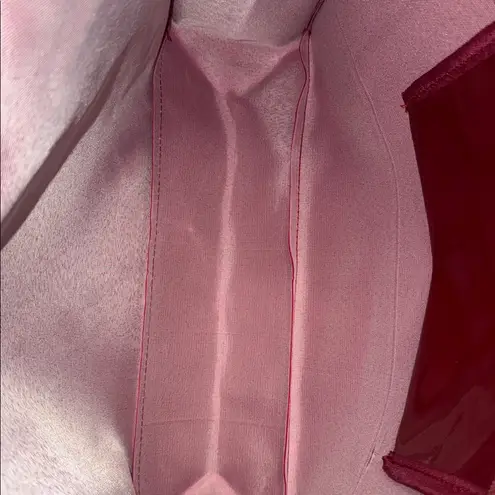 Glossy Red Tote Bag with Gold Lettering the perfect traveling bag